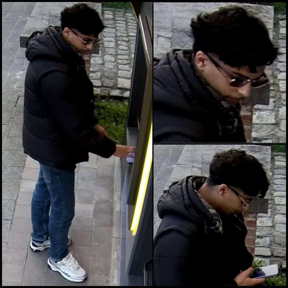 Jonge man gebruikt een bankautomaat in Lochristi.